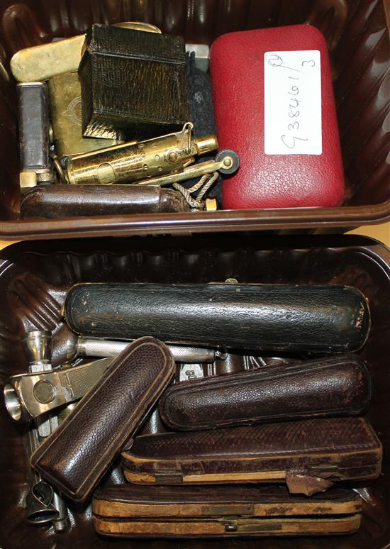 Collection of cigar & cigarette holders, cutters, novelty lighters etc